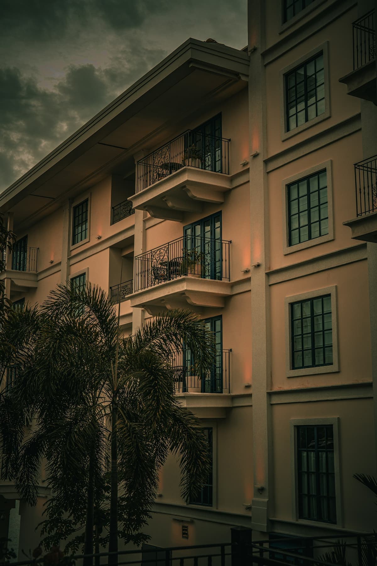 Elegant boutique hotel exterior at golden hour